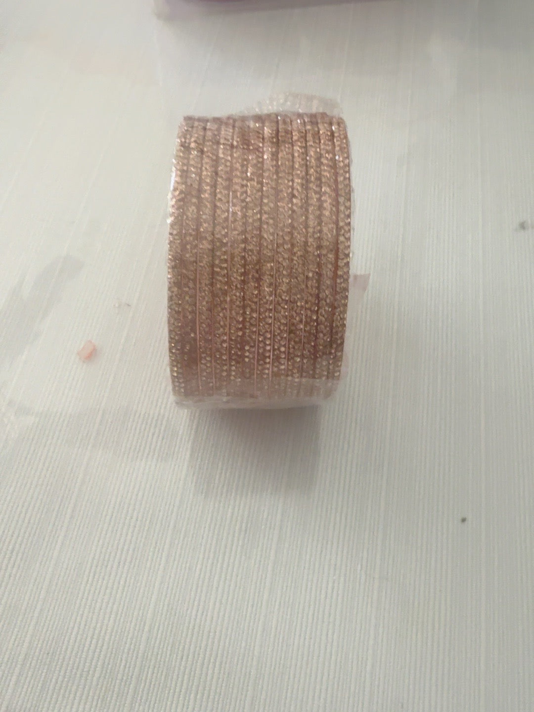 Rose gold-colored glass bangle set, size 2.10